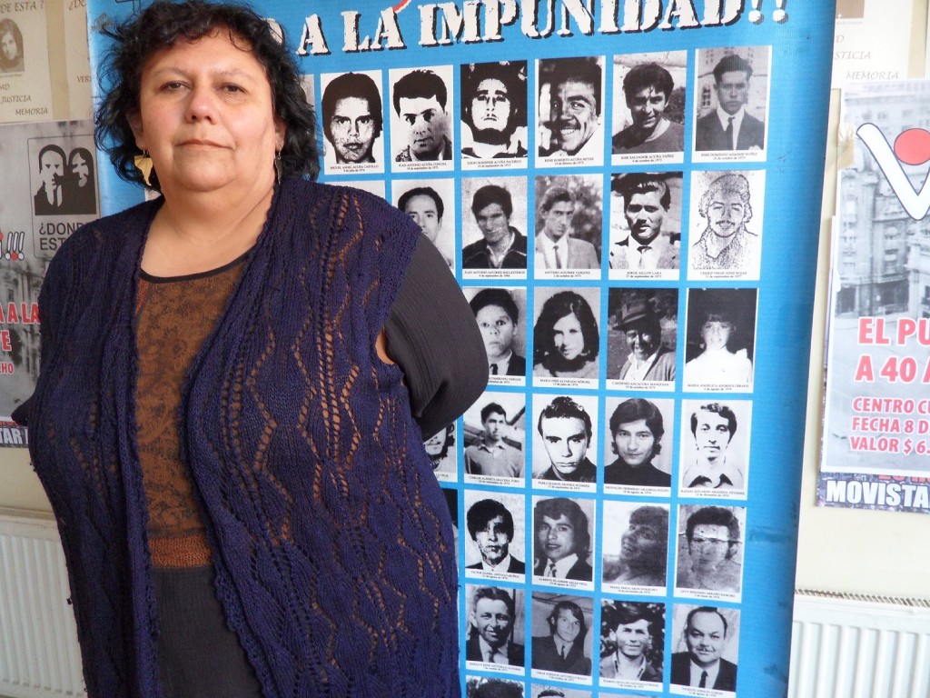 Lorena Pizarro, with a photo of those still missing